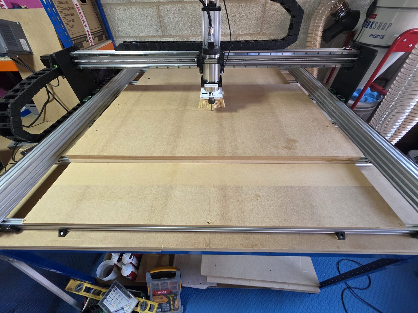 XOP's own CNC machine cutting a faceted cabinet baffle